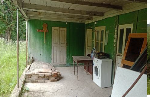 სასოფლო-სამეურნეო მიწის ნაკვეთი შენობით, ხარაგაულის მუნიციპალიტეტი, სოფელი ფარცხნალი, მე-3 ქუჩის I შესახვევი, N 8