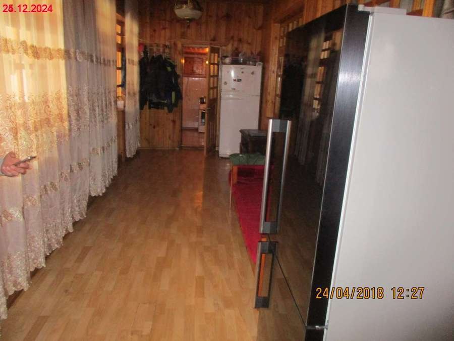 სასოფლო-სამეურნეო მიწის ნაკვეთი შენობით, მუნიციპალიტეტი მესტია, დაბა მესტია, ქუჩა კახიანი, N 45