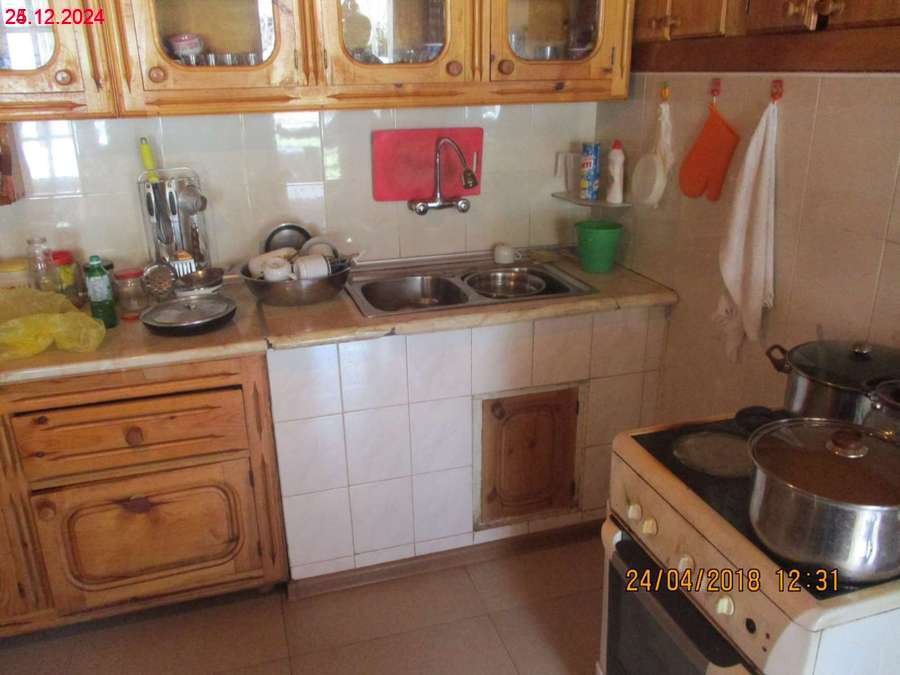 სასოფლო-სამეურნეო მიწის ნაკვეთი შენობით, მუნიციპალიტეტი მესტია, დაბა მესტია, ქუჩა კახიანი, N 45