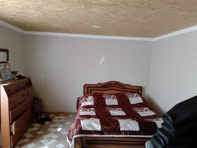 სასოფლო-სამეურნეო (საკარმიდამო) მიწის ნაკვეთი შენობით, მუნიციპალიტეტი სამტრედია, ადმინისტრაციული ერთეული მელაური, ნაკვეთი 877