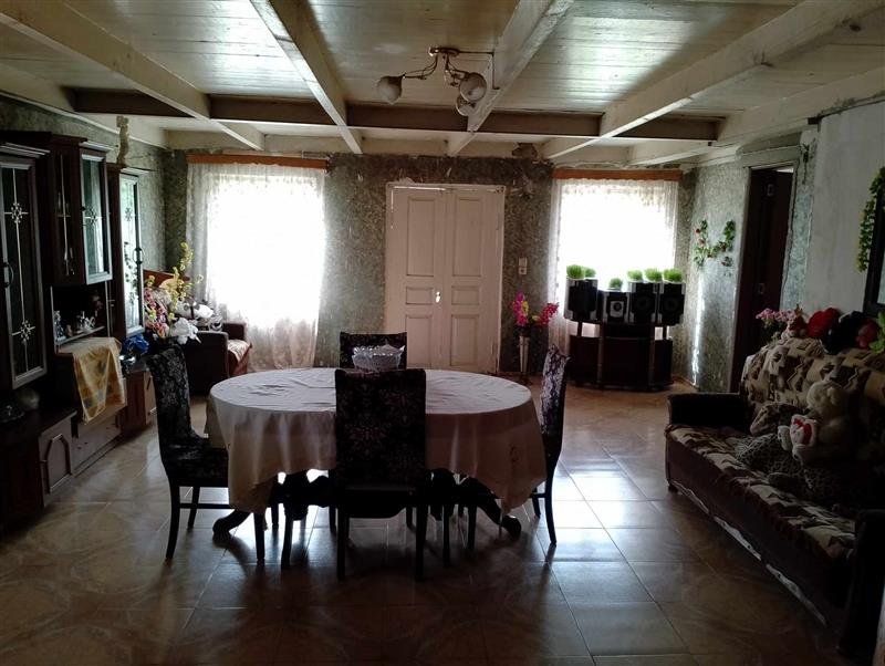 სასოფლო-სამეურნეო (საკარმიდამო) მიწის ნაკვეთი შენობით, მუნიციპალიტეტი სამტრედია, ადმინისტრაციული ერთეული მელაური, ნაკვეთი 877