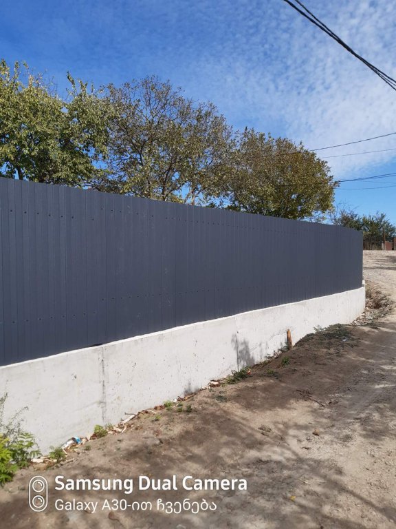 სასოფლო-სამეურნეო მიწის ნაკვეთი შენობით, ხაშურის მუნიციპალიტეტი, სოფელი დიდი ფლევი, 1-ლი ქუჩა, N 5