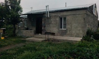 სასოფლო-სამეურნეო მიწის ნაკვეთი შენობით, ნინოწმინდის მუნიციპალიტეტი, სოფელი პატარა ხანჩალი, მე-5 ქუჩა, N 4