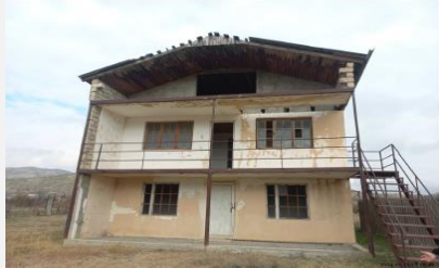 სასოფლო-სამეურნეო (საკარმიდამო) მიწის ნაკვეთი შენობით, მუნიციპალიტეტი კასპი, ადმინისტრაციული ერთეული აღაიანი, ნაკვეთი 724